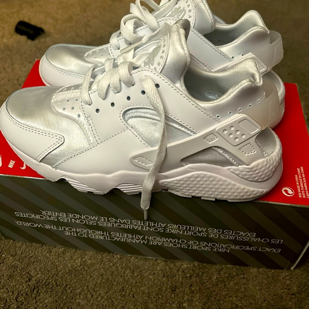 Women’s all white brand new huraches. Never worn.